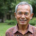Portrait of a smiling older man, Pak Wijaya