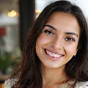 Portrait of a smiling young woman, Aisha